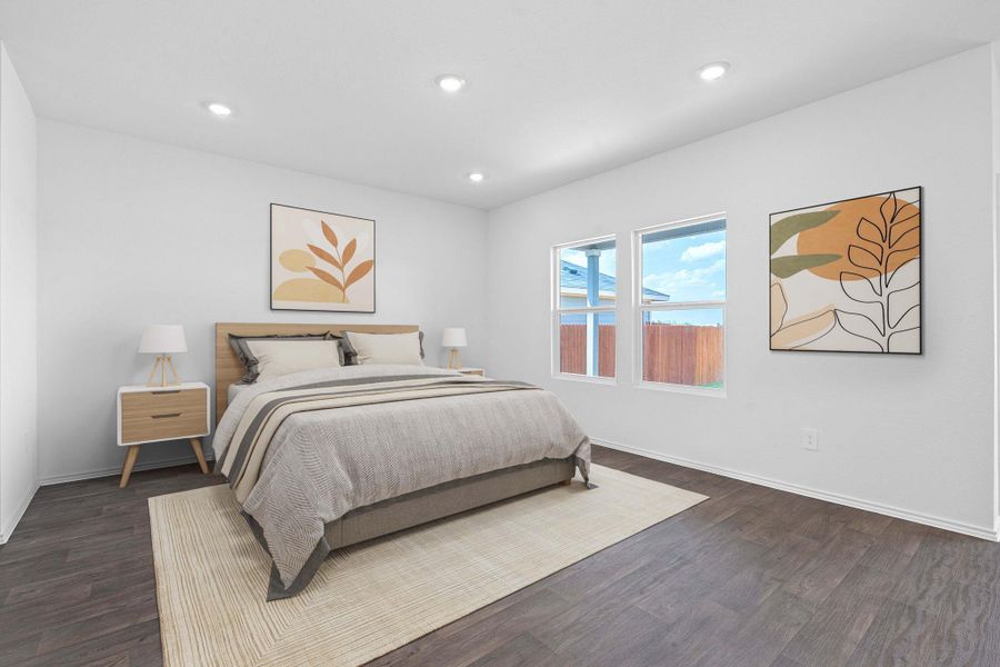 Bedroom featuring recessed lighting and dark wood finished floors Bedroom featuring recessed lighting and dark wood finished floors