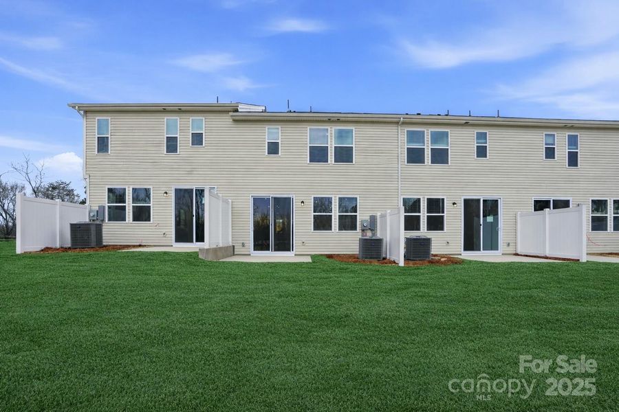 Exterior details and patio area of a home in , Charlotte (Image 3). Exterior details and patio area of a home in , Charlotte (Image 3).