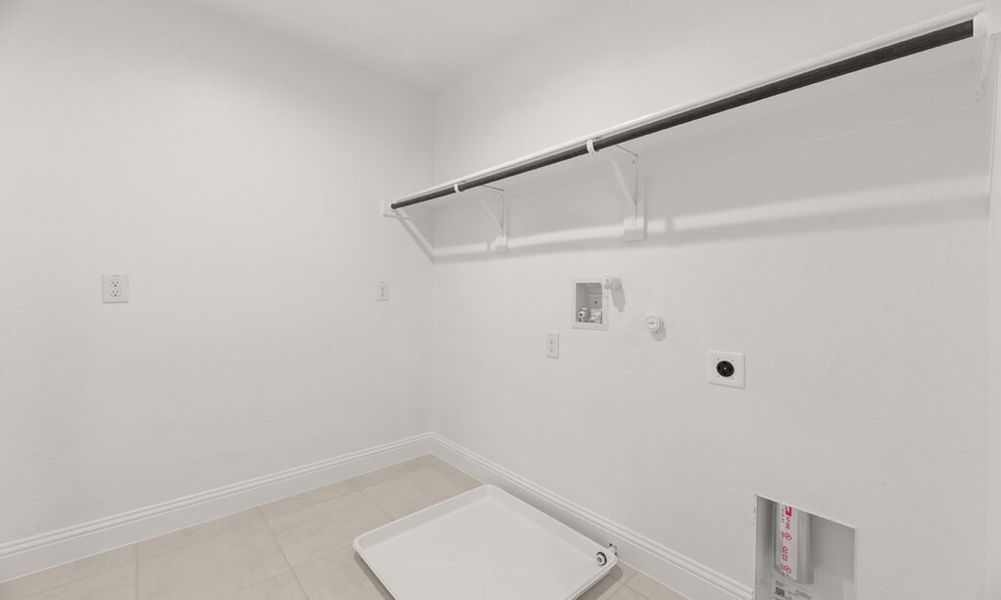 Representative exterior photo of a completed home built from the Granbury by Impression Homes in Main Street Village, Mansfield, TX (Image 21). Representative exterior photo of a completed home built from the Granbury by Impression Homes in Main Street Village, Mansfield, TX (Image 21).