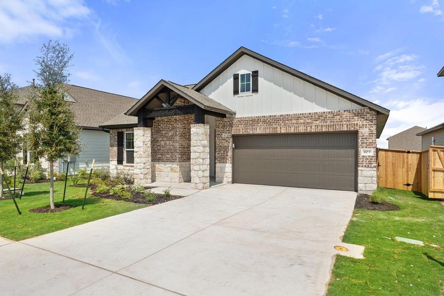 Front exterior of a new home in Park Collection At Park Central, Georgetown, TX, highlighting curb appeal (Image 22). Front exterior of a new home in Park Collection At Park Central, Georgetown, TX, highlighting curb appeal (Image 22).