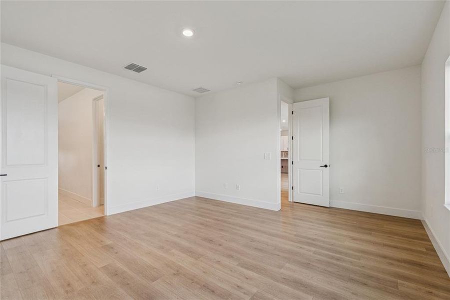 Spacious, unfurnished interior of a new home in Coasterra, Palmetto (Image 40).