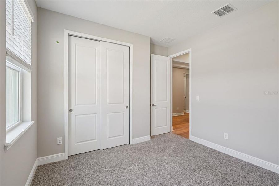 Spacious, unfurnished interior of a new home in Legends Preserve - Signature Series, Daytona Beach (Image 24). Spacious, unfurnished interior of a new home in Legends Preserve - Signature Series, Daytona Beach (Image 24).