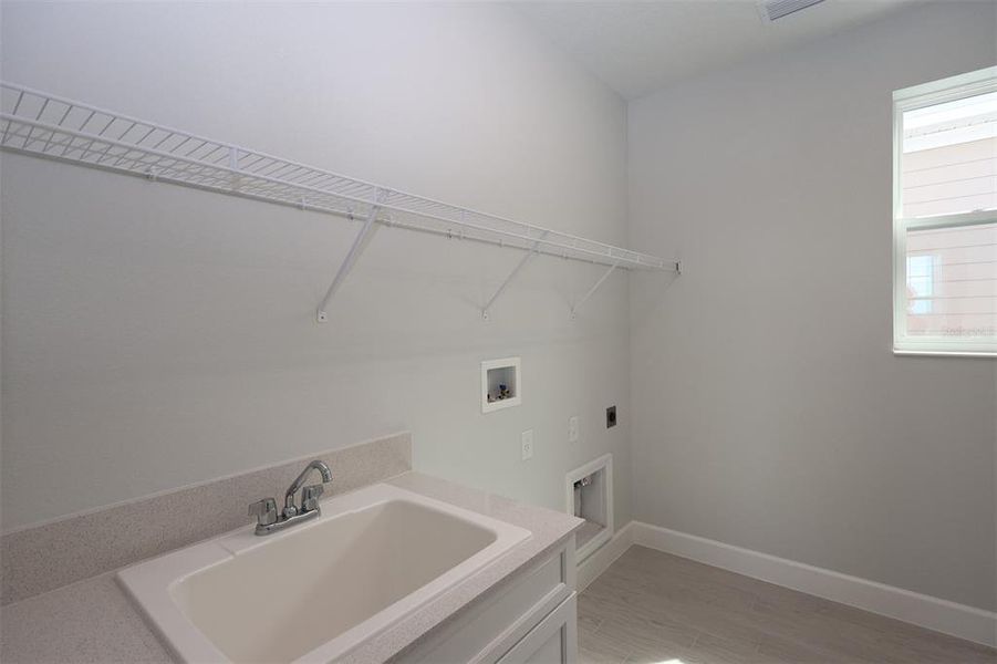 Furnished interior view inside a new home in Lake Star at Ovation, Winter Garden (Image 6).