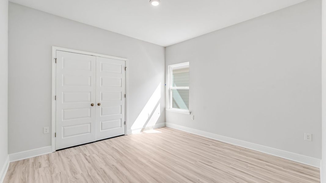 Spacious, unfurnished interior of a new home in WindMark Beach, Port Saint Joe (Image 29).