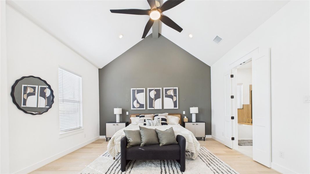 Primary Bedroom **Photo of model home with upgrade: accent wall**