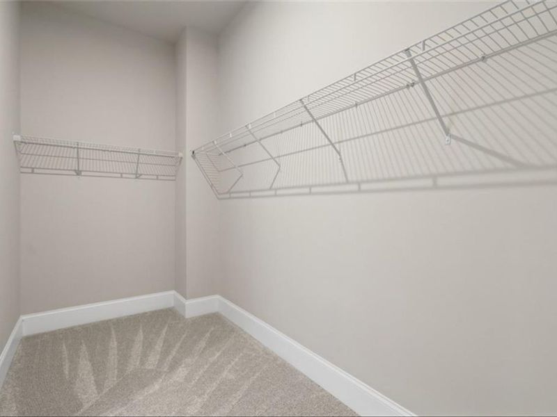 Spacious, unfurnished interior of a new home in The Village at Towne Lake, Woodstock (Image 43).