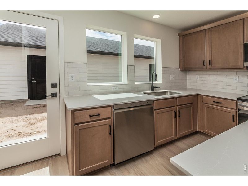 Furnished interior view inside a new home in Prairie Song Story Collection - Single Family Homes, Windsor (Image 4).