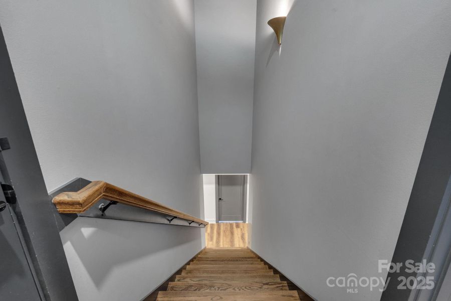 Stairs leading to basement & studio apartment