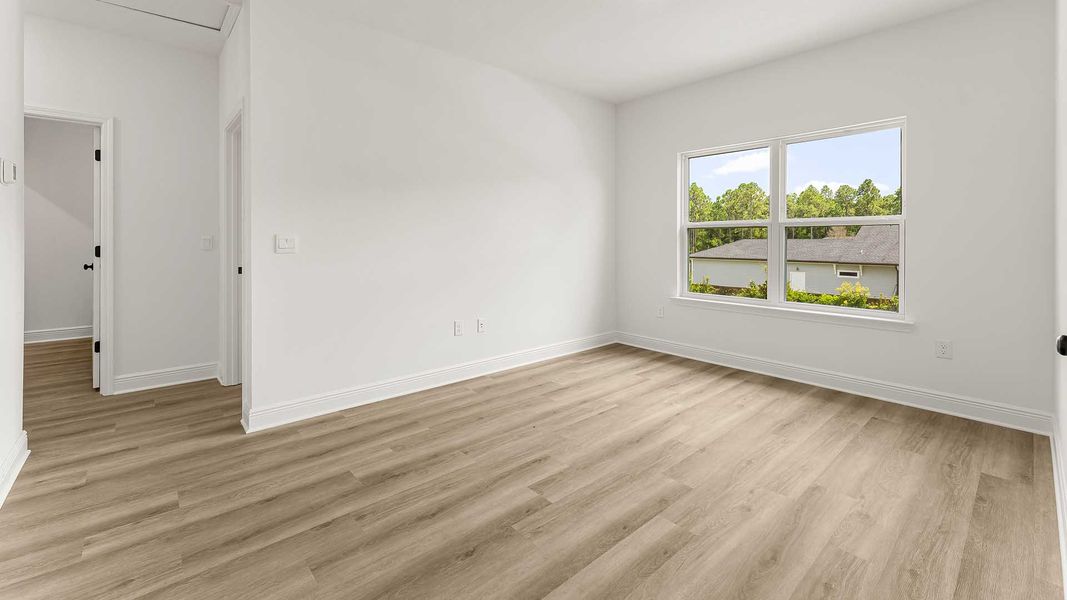 Spacious, unfurnished interior of a new home in Nellie Preserve, Santa Rosa Beach (Image 25).