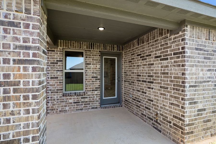 Representative exterior photo of a completed home built from the Cheyenne by Impression Homes in Baker Farms, Cleburne, TX (Image 24).