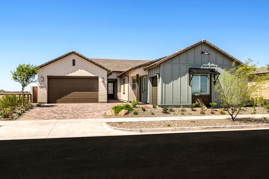 Representative exterior photo of a completed home built from the Pecan Plan 60-4 by Tri Pointe Homes in Blossom Rock, Apache Junction, AZ (Image 16).