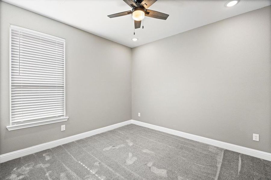 Carpeted 3rd BR with ceiling fan