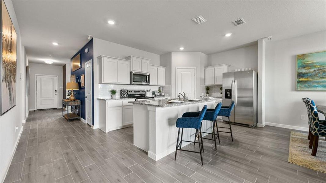 Kitchen - All Home and community information, including pricing, included features, terms, availability and amenities, are subject to change at any time without notice or obligation. All Drawings, pictures, photographs, video, square footages, floor plans, elevations, features, colors and sizes are approximate for illustration purposes only and will vary from the homes as built. Kitchen - All Home and community information, including pricing, included features, terms, availability and amenities, are subject to change at any time without notice or obligation. All Drawings, pictures, photographs, video, square footages, floor plans, elevations, features, colors and sizes are approximate for illustration purposes only and will vary from the homes as built.