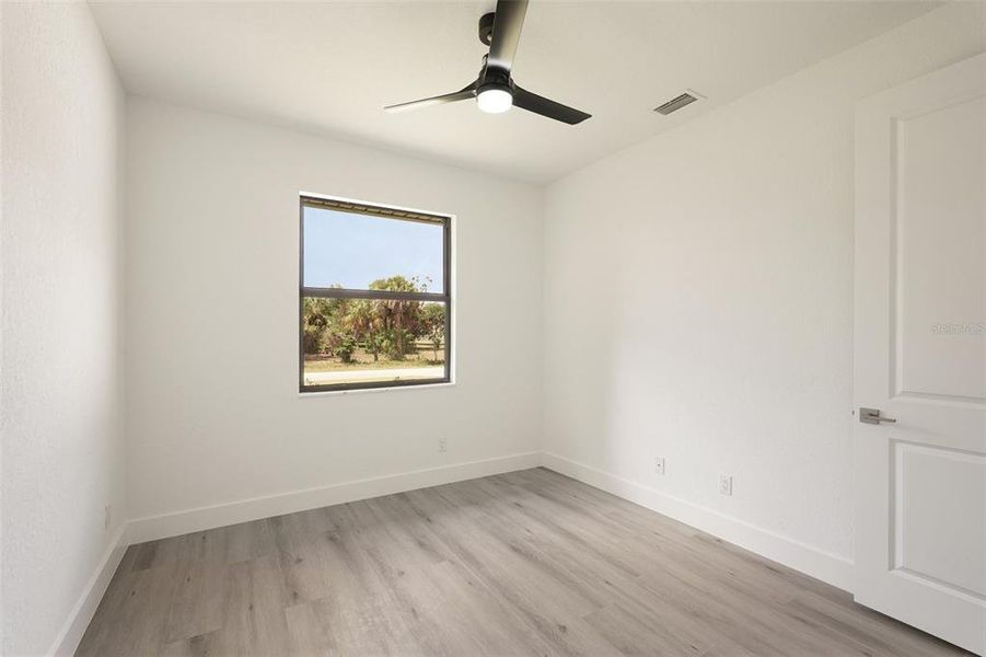 Spacious, unfurnished interior of a new home in , Port Charlotte (Image 33).