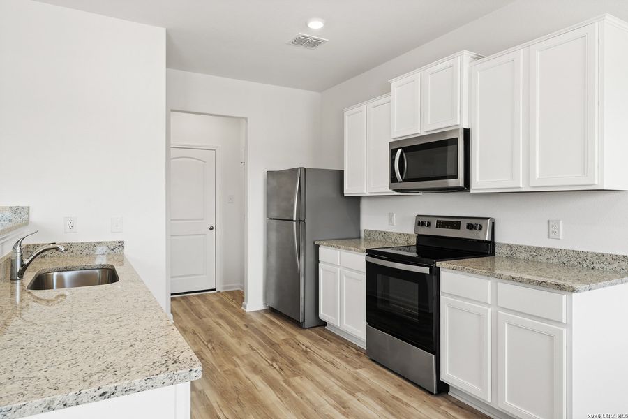 Furnished interior view inside a new home in , San Antonio (Image 4).