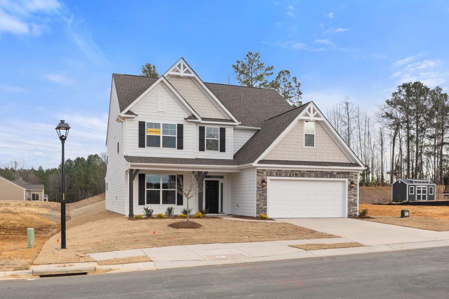 Front exterior of a new home in Wexford, Elon, NC, highlighting curb appeal (Image 25).