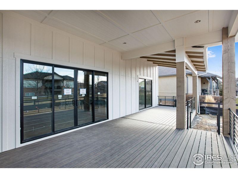 Spacious Deck with Doors off of the Living Room and Primary Bedroom Spacious Deck with Doors off of the Living Room and Primary Bedroom