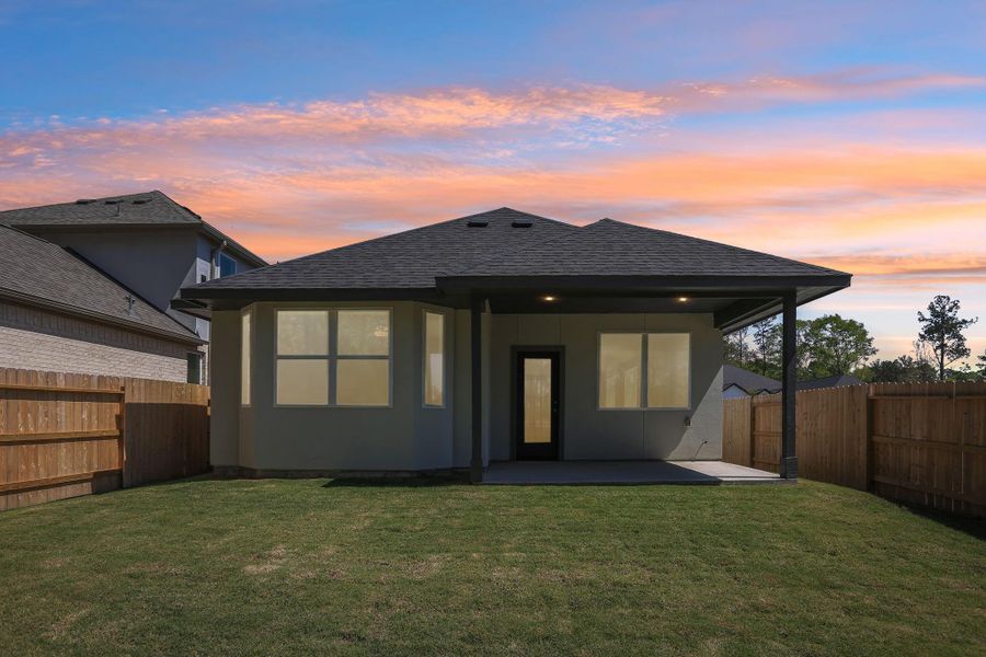 Exterior details and patio area of a home in Woodhavyn 40', Magnolia (Image 19).
