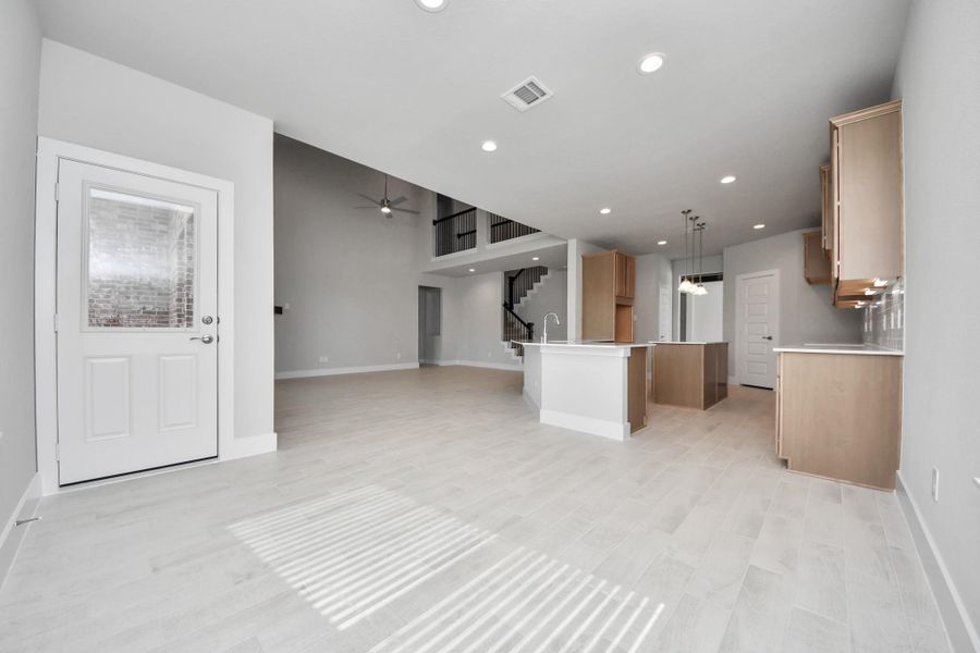 View from the breakfast area to the kitchen and living room.