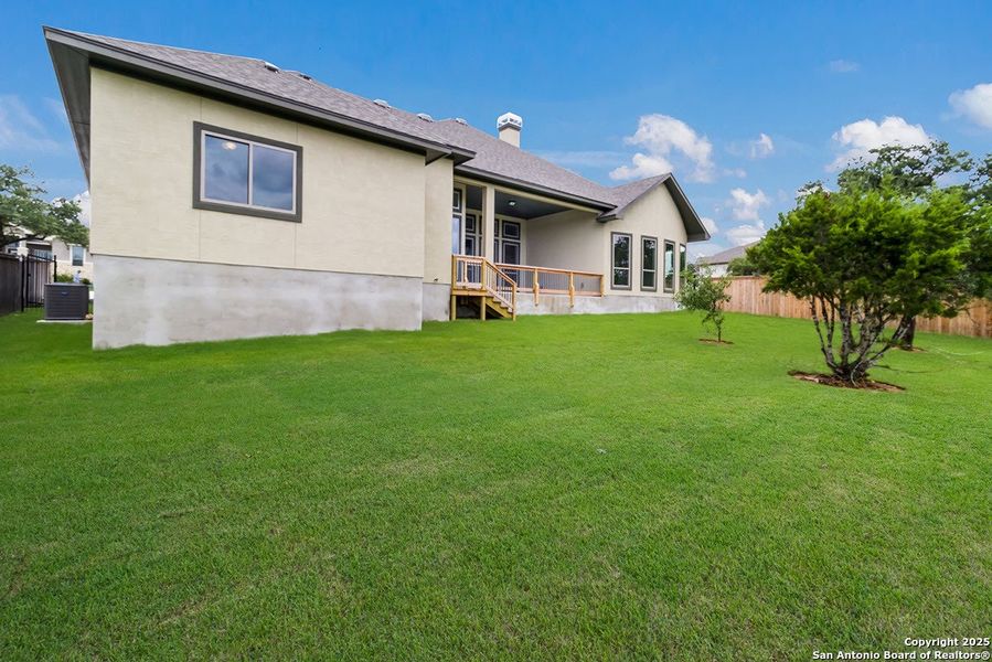 Front exterior of a new home in Johnson Ranch, Bulverde, TX, highlighting curb appeal (Image 18). Front exterior of a new home in Johnson Ranch, Bulverde, TX, highlighting curb appeal (Image 18).