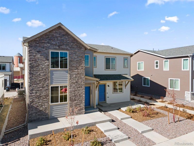 Front exterior of a new home in , Longmont, CO, highlighting curb appeal (Image 23). Front exterior of a new home in , Longmont, CO, highlighting curb appeal (Image 23).