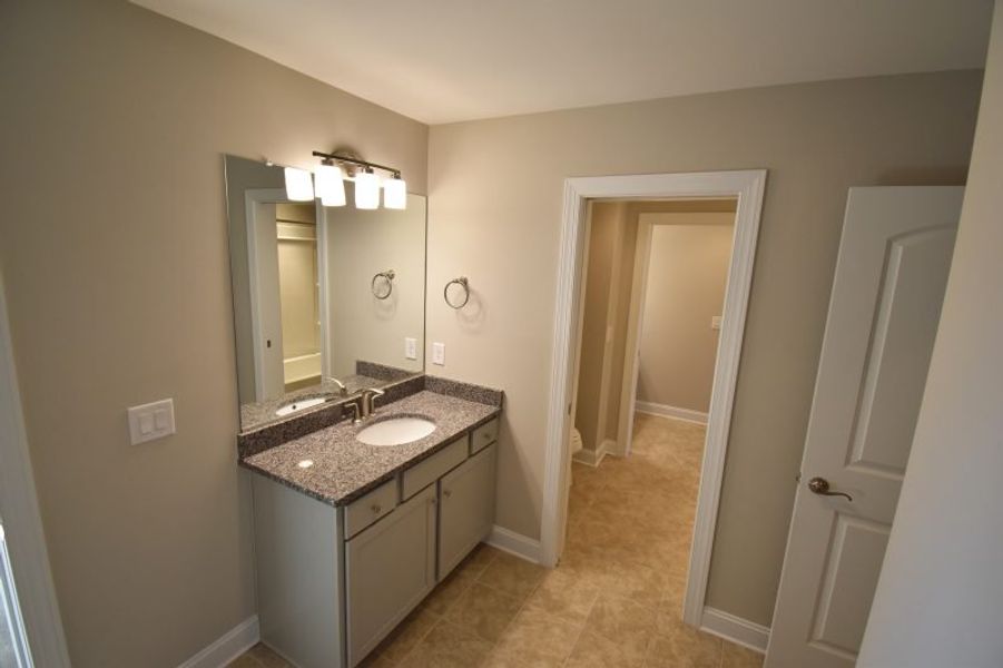 Representative furnished interior of a home built from the Lancaster by Keystone Homes NC in Preserve at Carriage Cove, Oak Ridge (Image 14).