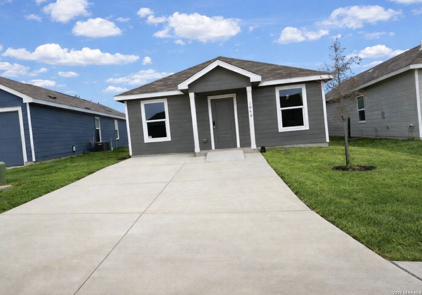 Front exterior of a new home in Mission del Lago, San Antonio, TX, highlighting curb appeal (Image 1). Front exterior of a new home in Mission del Lago, San Antonio, TX, highlighting curb appeal (Image 1).