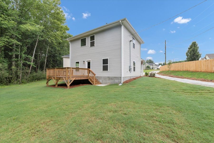 Exterior details and patio area of a home in Scarlett Place, Bowdon (Image 4).