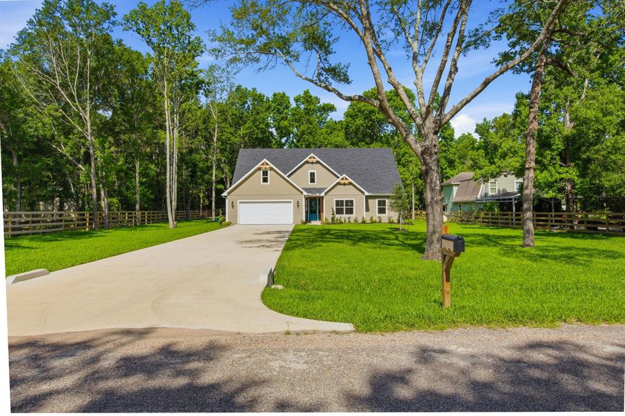 Front exterior of a new home in , Magnolia, TX, highlighting curb appeal (Image 21).