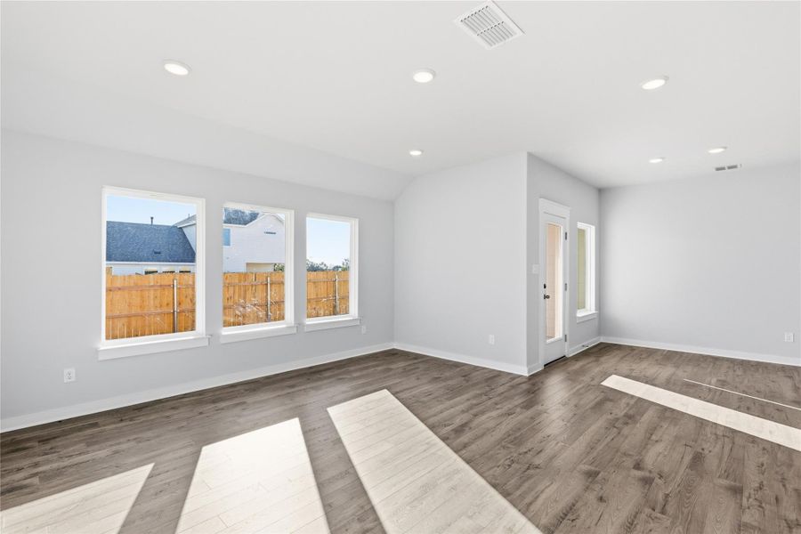 Unfurnished room featuring recessed lighting and wood finished floors