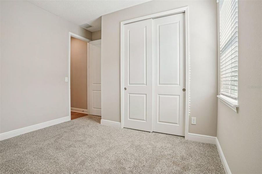 Spacious, unfurnished interior of a new home in Legends Preserve - Signature Series, Daytona Beach (Image 39).