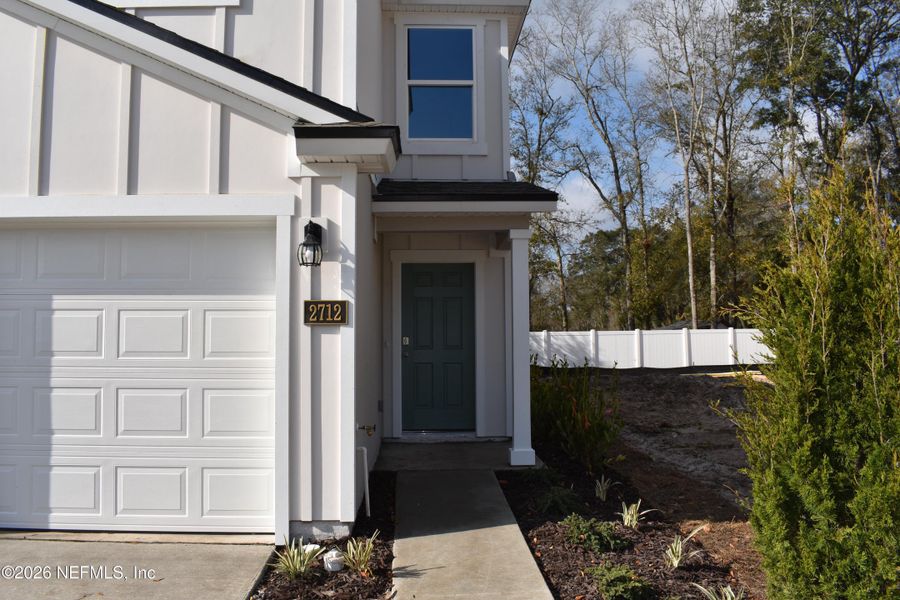 Exterior details and patio area of a home in Irongate Villas, Jacksonville (Image 2).