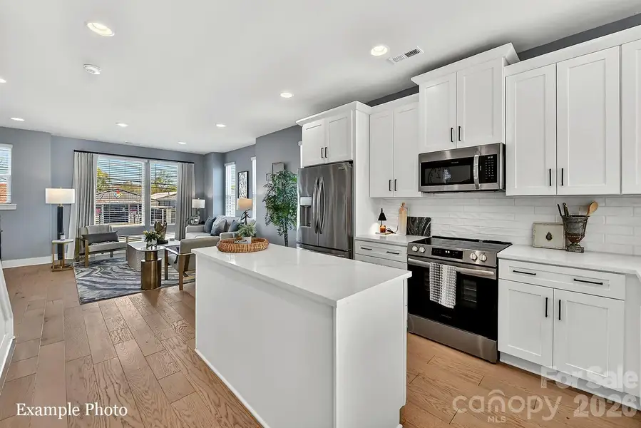 Furnished interior view inside a new home in North End Terraces, Charlotte (Image 9).