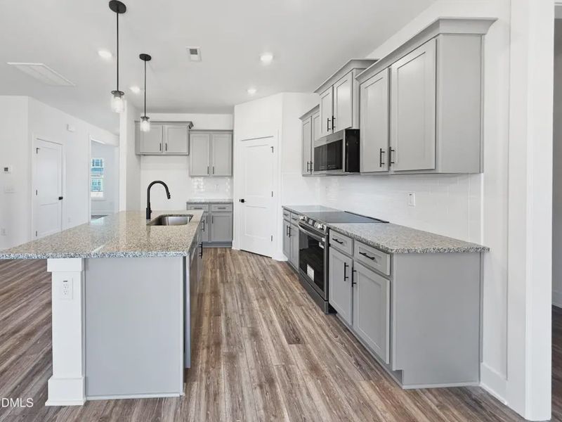 Furnished interior view inside a new home in Charlotte's Ridge, Middlesex (Image 7).