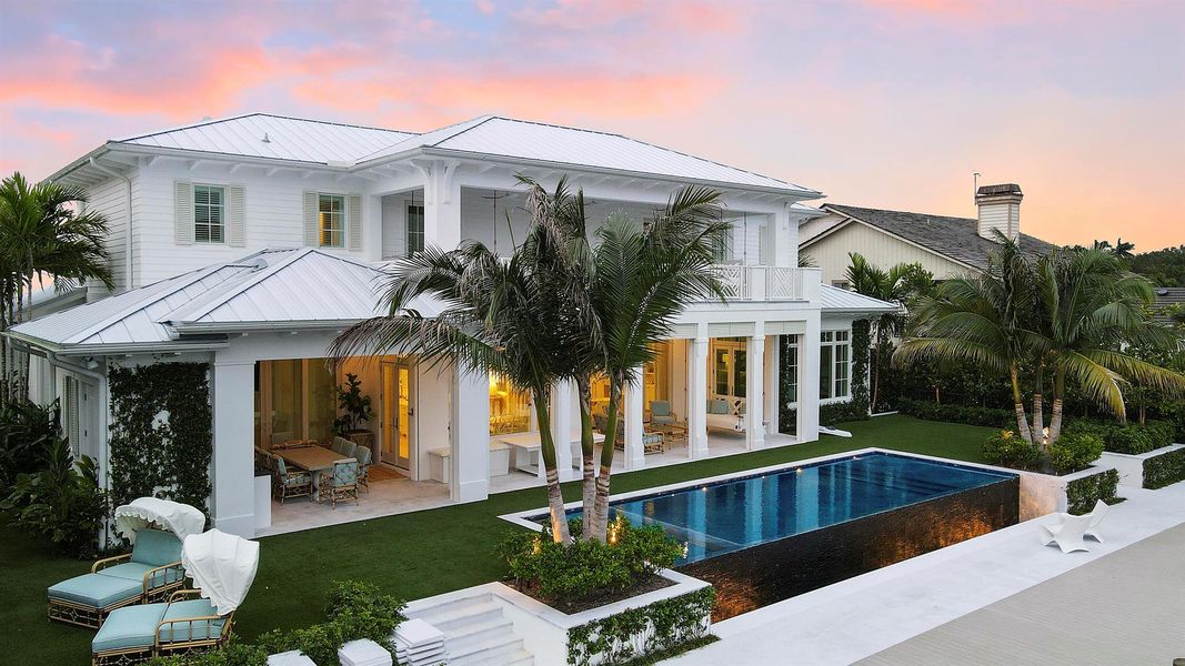 Front exterior of a new home in , North Palm Beach, FL, highlighting curb appeal (Image 23). Front exterior of a new home in , North Palm Beach, FL, highlighting curb appeal (Image 23).