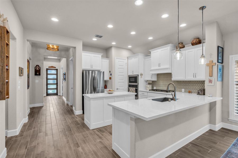 This home was built with premium upgrades throughout including 5" baseboards, 9' doors, upgraded lighting and fixtures. This home was built with premium upgrades throughout including 5" baseboards, 9' doors, upgraded lighting and fixtures.