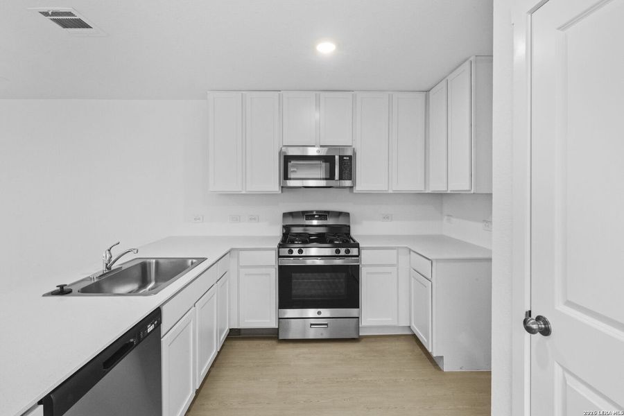 Furnished interior view inside a new home in Spring Grove, St. Hedwig (Image 8).