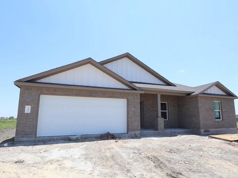 In-progress construction of a new home in Carillon, Manor, TX (Image 4).