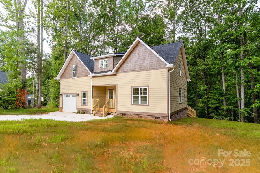 Front exterior of a new home in , China Grove, NC, highlighting curb appeal (Image 2).