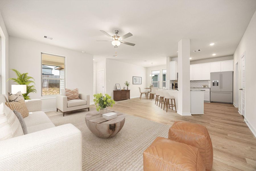 This open-concept layout showcases a bright and airy design with large windows that fill the space with natural light. The modern kitchen seamlessly connects to the dining and living areas, creating a comfortable and functional flow. Neutral tones, recessed lighting, and clean finishes highlight the home's contemporary style. This open-concept layout showcases a bright and airy design with large windows that fill the space with natural light. The modern kitchen seamlessly connects to the dining and living areas, creating a comfortable and functional flow. Neutral tones, recessed lighting, and clean finishes highlight the home's contemporary style.