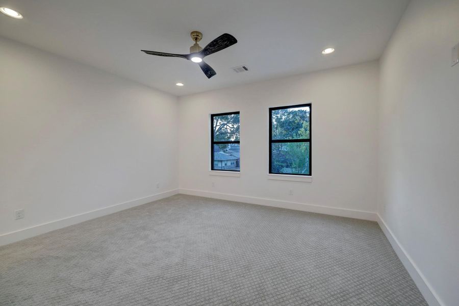 Secondary bedrooms come standard with carpet but can be upgraded to wood flooring.*photos are of a previously constructed home by the builder. 1527 Hewitt may have different selections at builders sole discretion. These photos are not meant to be an exact representation of 1527 Hewitt.