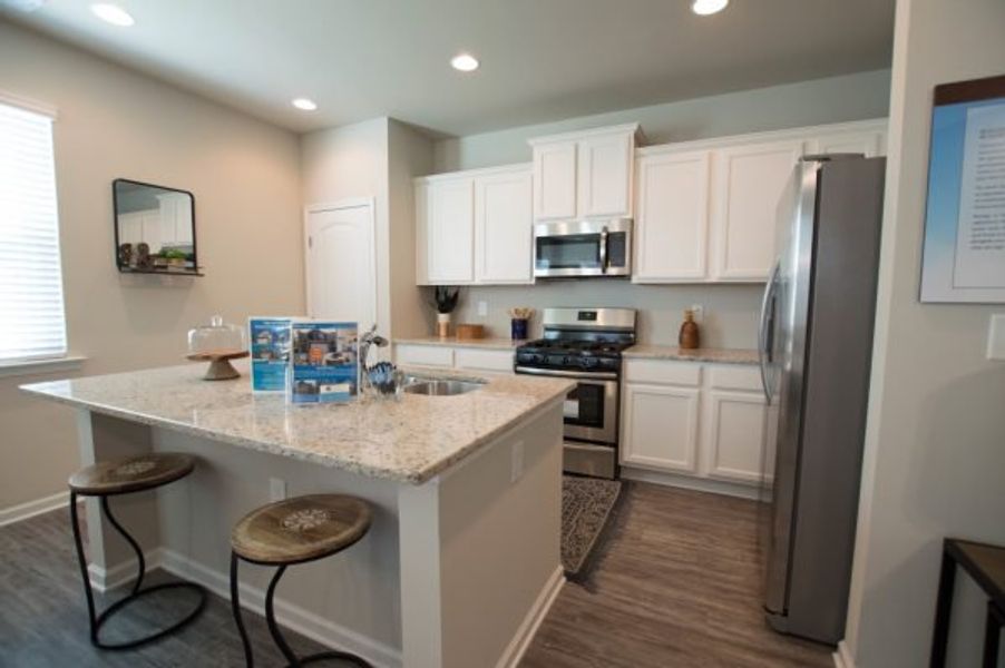 Representative furnished interior of a home built from the Glade by Piedmont Residential in Meadowyn, Cartersville (Image 9).