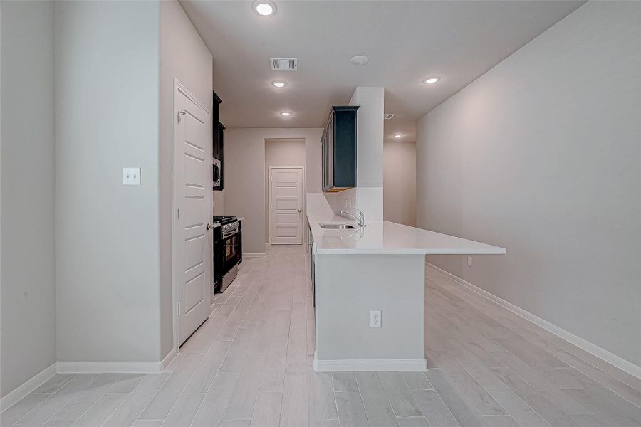 Furnished interior view inside a new home in Woodland Lakes, Huffman (Image 12).