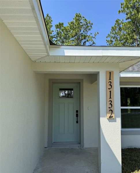 Front exterior of a new home in , Ocala, FL, highlighting curb appeal (Image 1).