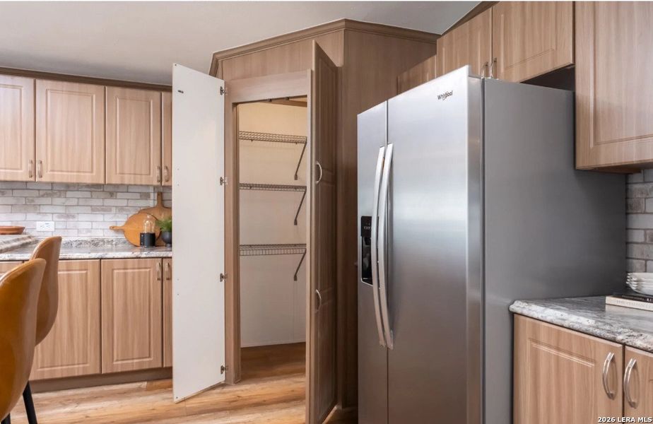 Furnished interior view inside a new home in , Elmendorf (Image 23).
