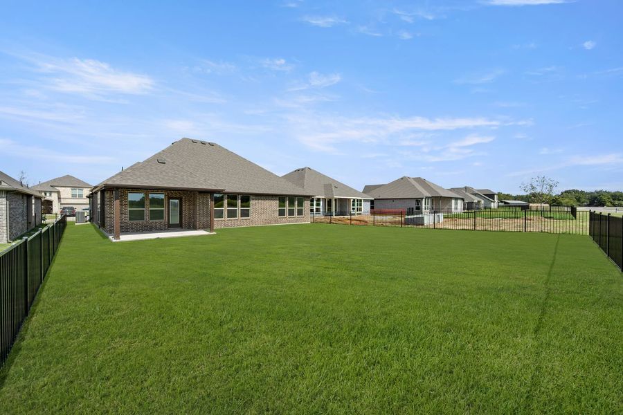 Exterior details and patio area of a home in Abe’s Landing, Granbury (Image 4). Exterior details and patio area of a home in Abe’s Landing, Granbury (Image 4).