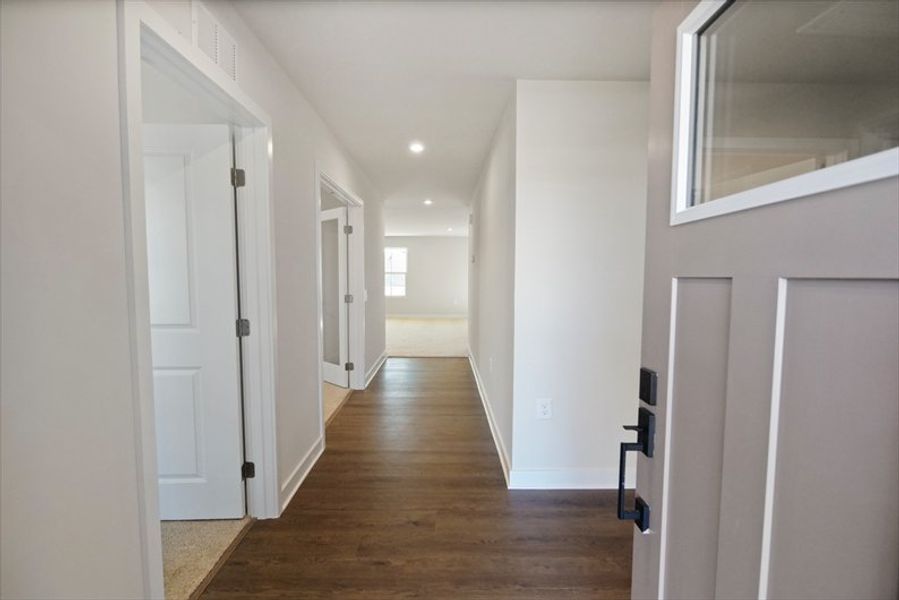 Spacious, unfurnished interior of a new home in Reidville Town Center Cottages, Duncan (Image 10).