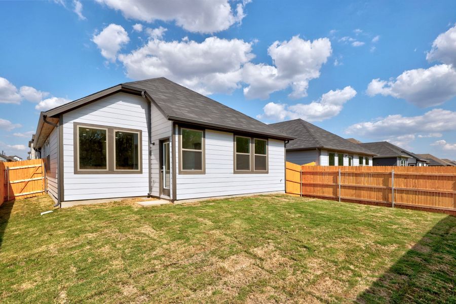 Exterior details and patio area of a home in Trinity Ranch, Elgin (Image 20).