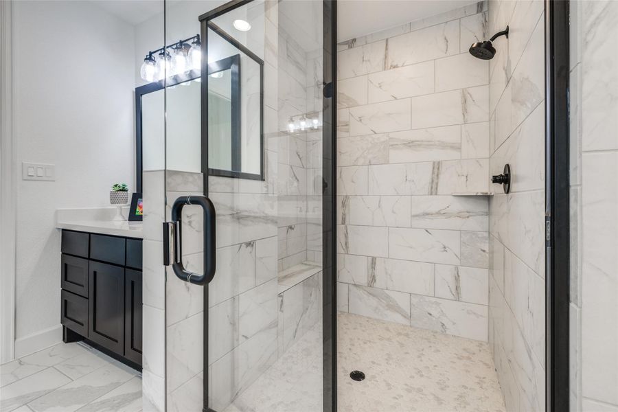 Beautiful Primary Suite with stand alone shower, large bath, beautiful dark cabinets, dual sinks  oil rubber bronze fittings