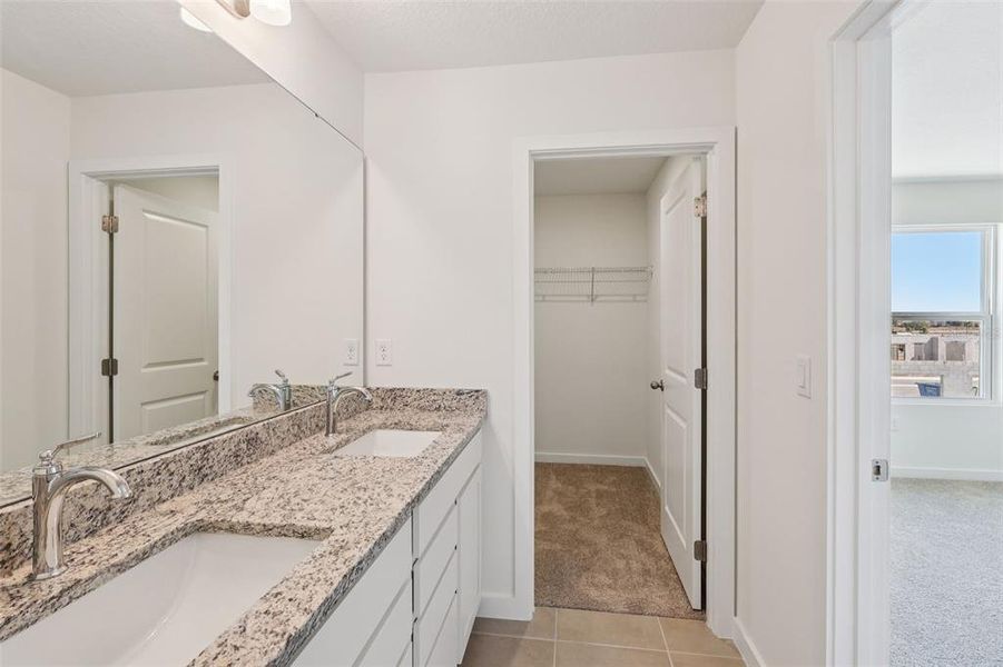 Furnished interior view inside a new home in Cyrene at Harmony, St. Cloud (Image 13).